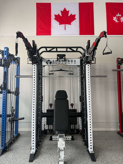Spartaks Strength KB2406 6-Post Full Rack Functional Trainer (3”×3”, 9-Gauge Steel) in gym with Canadian flags.