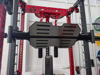 Spartaks Strength Leg Press Pedal Attachment for Smith Machine, showcasing versatility in gym equipment.