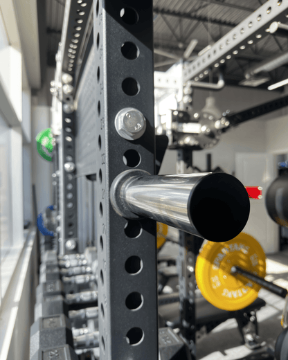 Spartaks Strength Weight Plate Holders (3"x3", 1" Hole) – Pair with Bolts (Set of 2) mounted on gym rack.