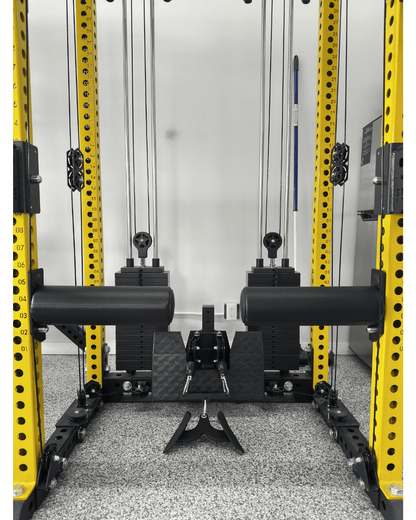 Bulgarian Knee Locker (pair) mounted on a strength training rack, ideal for home gym setup in Canada.