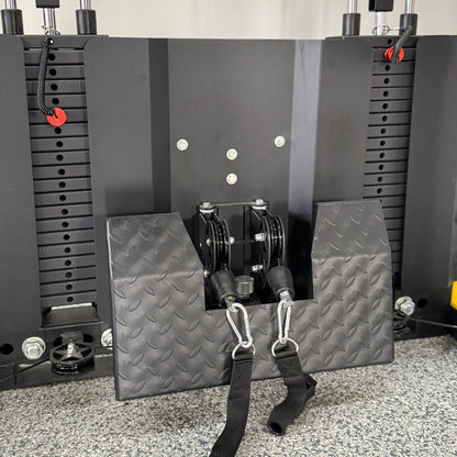Textured metal footplate for functional trainer attached to a double weight stack and dual pulleys